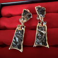 Vintage Black Stone Chip Mosaic Dangle Clip On Earrings Gold Tone Brutalist0