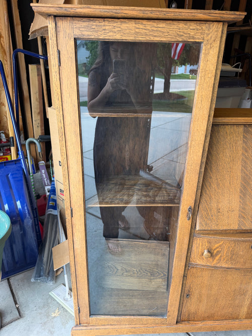Antique glass front oak display case detail